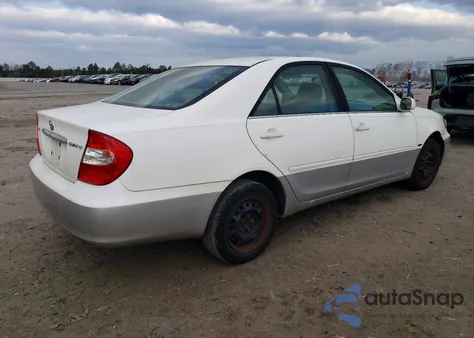 2003 Toyota Camry Le z USA, uszkodzony, nr VIN 4T1BE32K63U230743